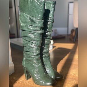 Dark green patent leather knee high boots by Charles David